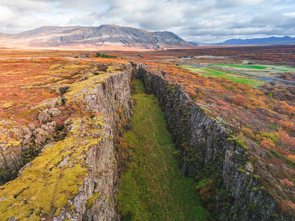 Deep rocky canyon with greenery