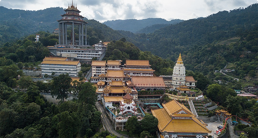 Temple on Mountain surrounded by trees