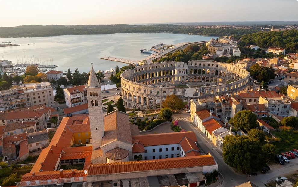 Aerial view of Roman amphitheater by coast