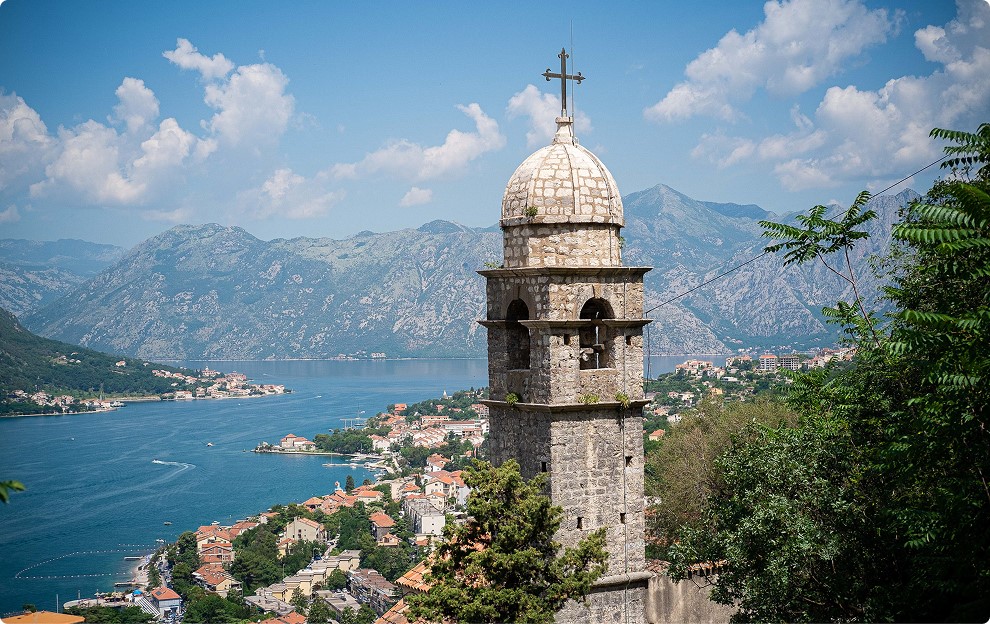 Stone tower above coastal bay