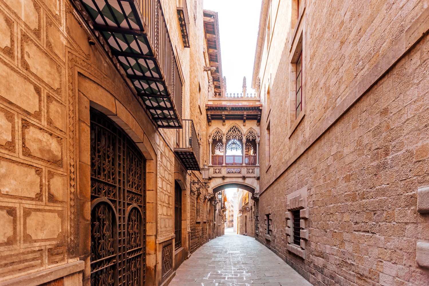 Narrow street with Gothic arch