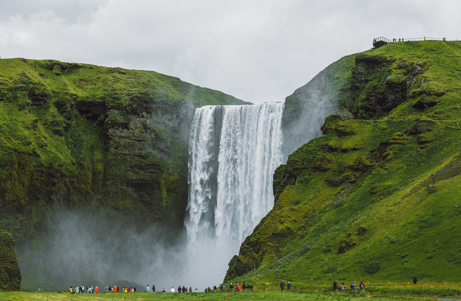 Large waterfall between cliffs